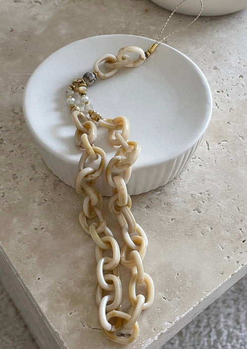 Bijoux de téléphone beige